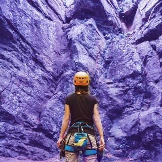 Image of woman about to start mountain climbing