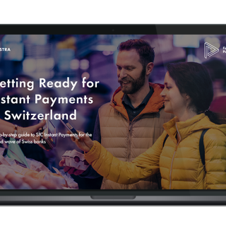 Image of laptop with cover slide of "Getting Ready for Instant Payments in Switzerland" ebook
