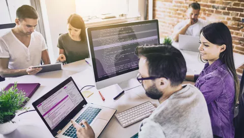 Image of people working in an office