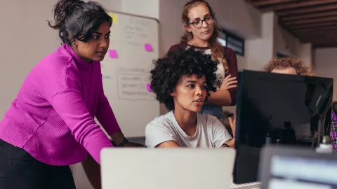 Women collaborating in office