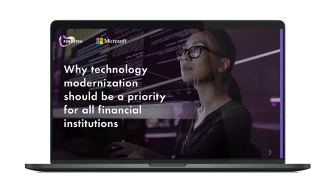 Image of laptop with cover slide for "Why technology modernization ..." white paper