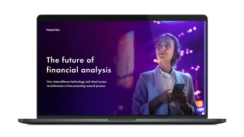 Image of laptop with cover slide for "FlashSpread cloud: The future of financial analysis" white paper