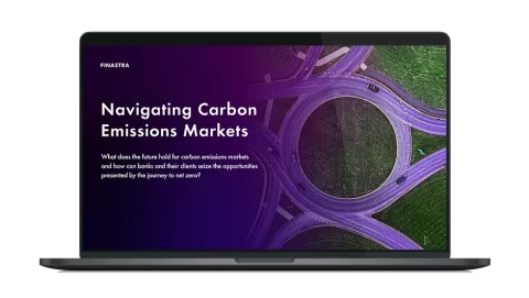 Image of laptop with cover slide for "Navigating carbon emissions markets" white paper