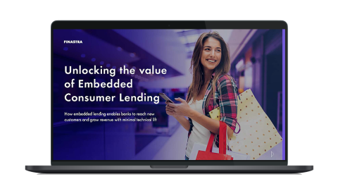 Image of laptop with cover slide for "Unlocking the value of embedded consumer lending" white paper