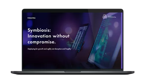 Image of laptop with cover slide for "The advantage of a symbiosis strategy" white paper