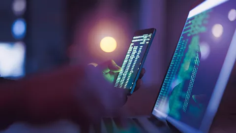 Image of mobile phone and laptop screen with tallies displayed