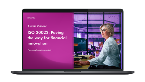 Image of laptop with cover slide for "ISO 20022: Paving the way for financial innovation" brochure