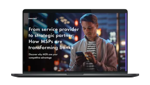 Image of laptop with cover slide of "From service provider to strategic partner: How MSPs are transforming banks" eBook