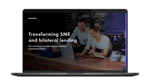 Image of laptop with cover slide for the "Transforming SME and bilateral lending" white paper