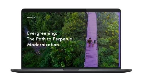 Image of laptop with cover slide of "Evergreening: The path to perpetual modernization" white paper