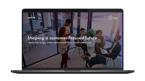 Image of laptop with cover slide of "Shaping a customer-focused future" white paper