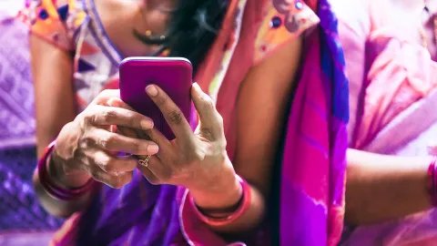 Image of person hands holding a smartphone