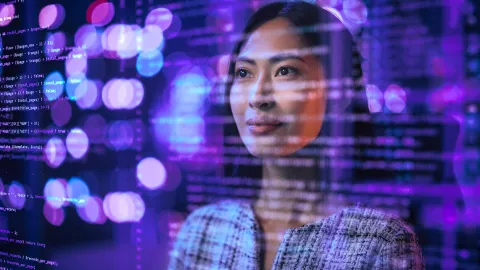 Image of person looking at holographic data