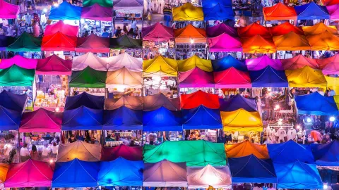 Aerial view of a market with multicolored roofs