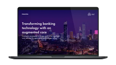 Image of laptop with cover slide of "Transforming banking technology with an augmented core" white paper
