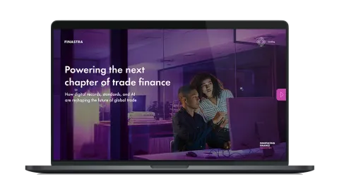 Image of laptop with cover slide of "Powering the next chapter of trade finance" white paper