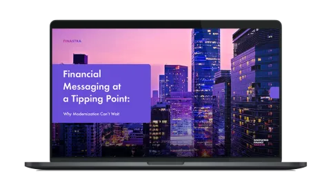 Image of laptop with cover slide of "Financial messaging at a tipping point: Why modernization can’t wait" ebook