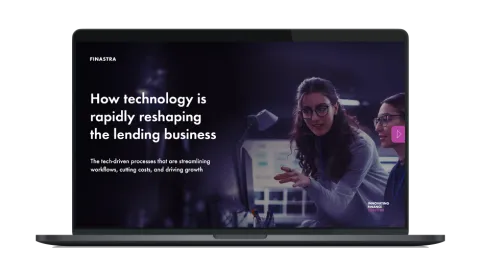 Image of laptop with cover slide of "How technology is rapidly reshaping the lending business" white paper