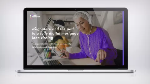 Woman with headphones at desk