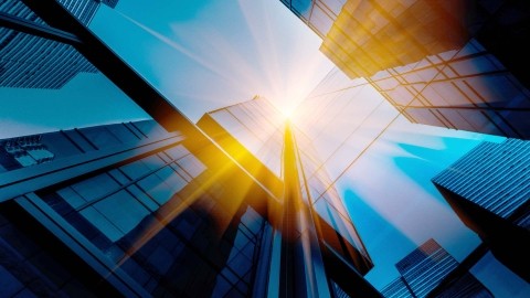 Image of buildings with sun flare effect