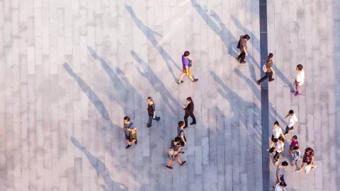 Image of top down view of people walking