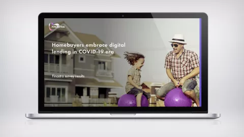 Image of laptop with man and child on bounce balls