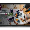 People working at table with computers