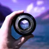 Image of a mountain and sea horizon seen through a lens